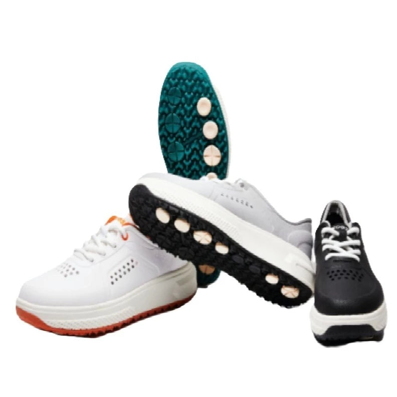 White, black, grey and red golf sneakers with colour accents on a white background